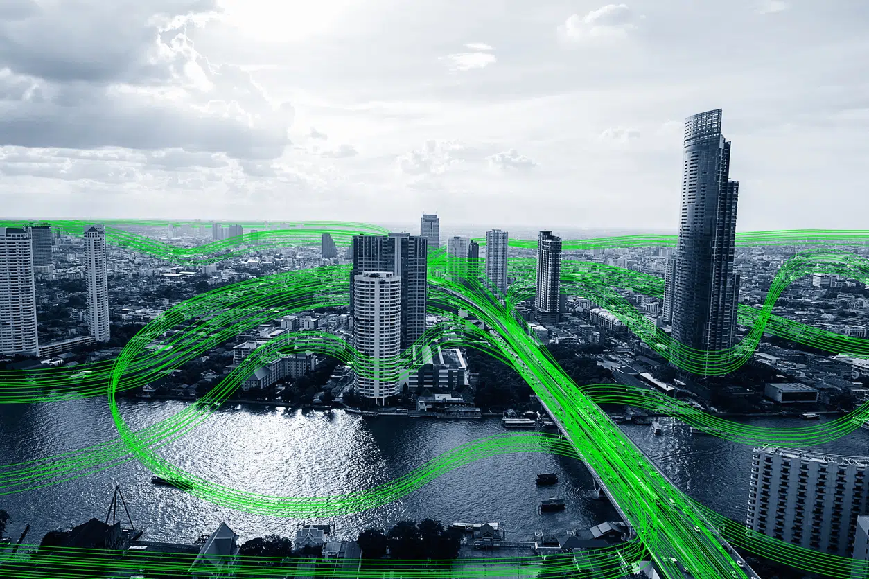 Black and white smart city with green data communication flow graphics image