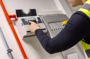 man checking PSTN switch-off panels image